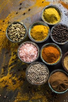 Wooden table of colorful spices