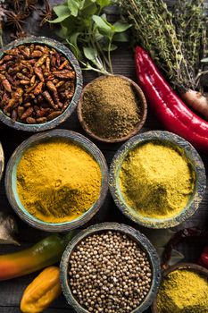 Spices over wooden background