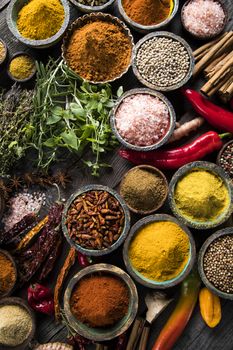 Spices over wooden background