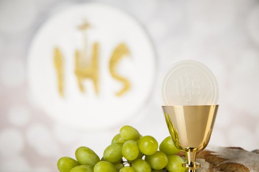 Holy communion elements on white background