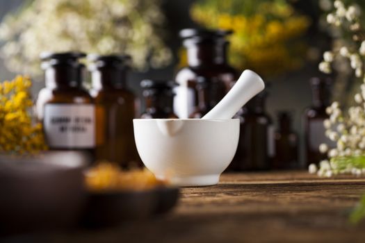 Herbal medicine on wooden desk background