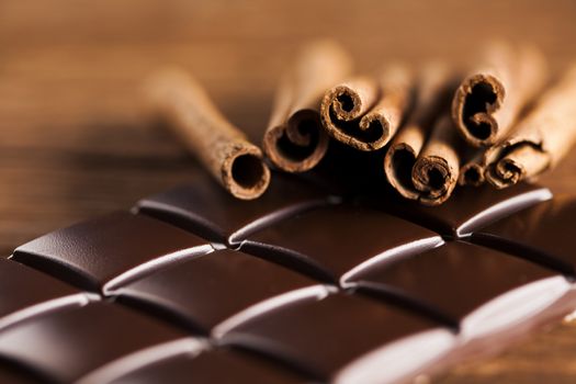 Bars Chocolate , candy sweet, dessert food on wooden background