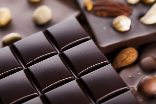 Bars Chocolate , candy sweet, dessert food on wooden background