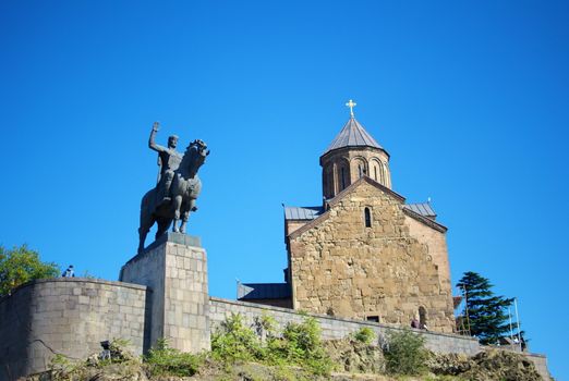 The Metekhi Temple and the monument of Vakhtang Gorgasali in Tbilisi, Georgia.
