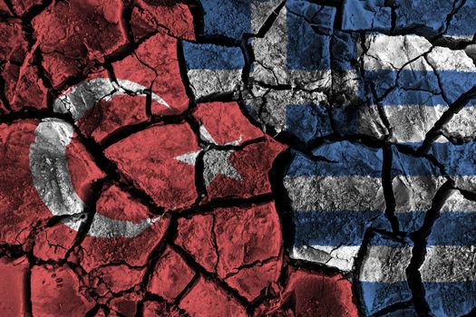 Turkey and Greece flag on cracked ground . Confliction and crisis concept .