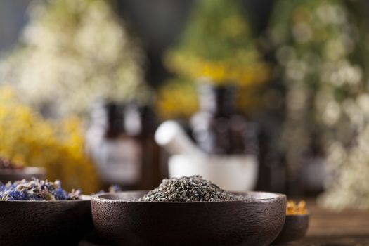 Natural medicine on wooden table background