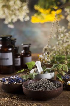 Herbal medicine on wooden desk background