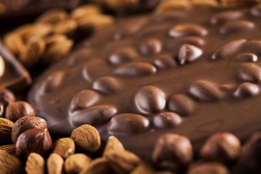 Bars Chocolate , candy sweet, dessert food on wooden background