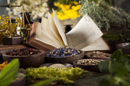 Natural medicine on wooden table background