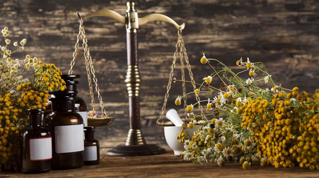 Herbal medicine on wooden desk background