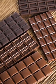 Chocolate , candy sweet, dessert food on wooden background