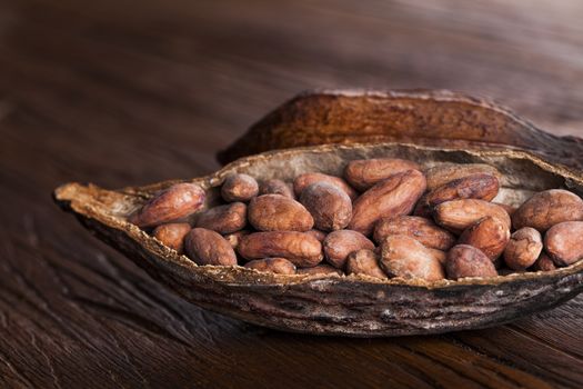 Cocoa pod on wooden table