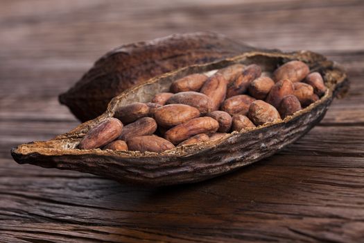 Cocoa pod on wooden table