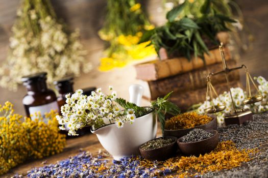 Natural medicine on wooden table background