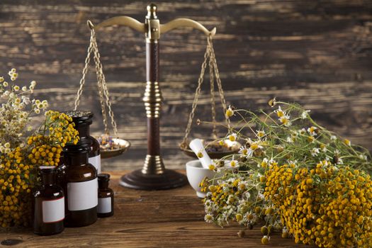 Herbal medicine on wooden desk background