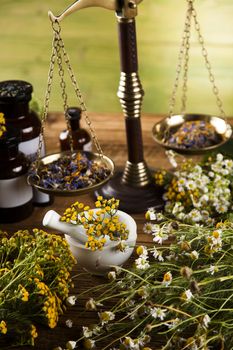 Natural medicine on wooden table background