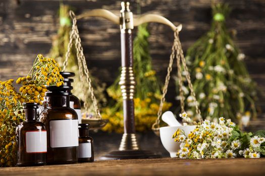 Herbal medicine on wooden desk background