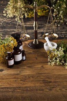 Herbal medicine on wooden desk background