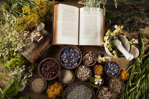 Natural medicine on wooden table background