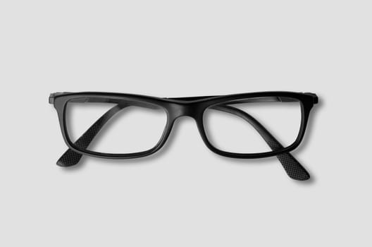 Black eye glasses isolated on grey background