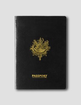 Generic black passport isolated on grey background
