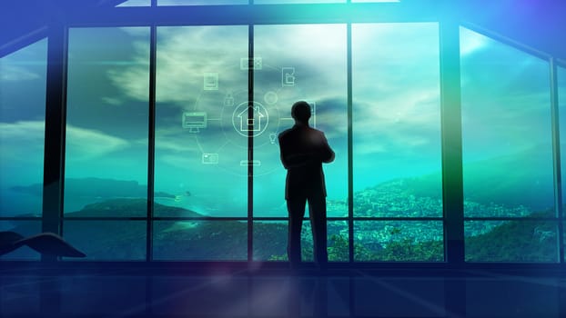 Silhouette of a man in a huge office in front of large windows.