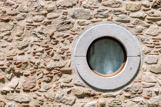 The circle window on stone wall, for background