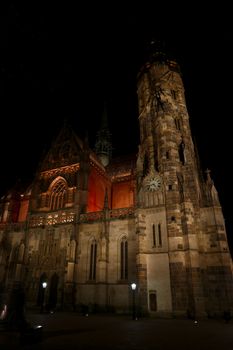 Low angle side view of gothic medieval Cathedral of Saint Elisabeth in Kosice, Slovakia, illuminated in the night