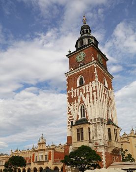 Low angle view of Town Hall tower at Main Market Square of Krakow, Poland