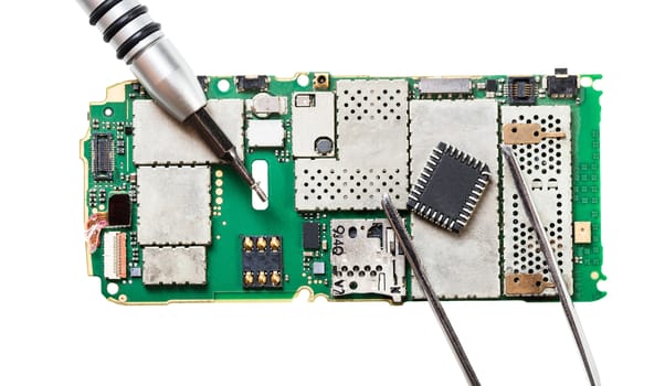 disassembled mobile phone on white isolated background