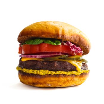 Big fresh tasty burger isolated on white background