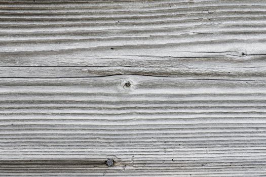 Wood texture with natural pattern. A fragment of a wooden panel