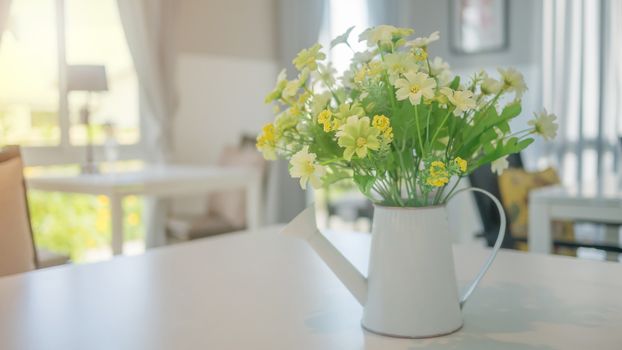 A bouquet of artificial flowers in pot