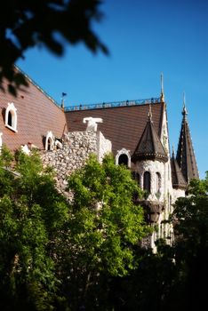 Beautiful old fairy-tale castle near Burgas, Bulgaria. Walls of the castle, green flower garden 