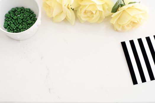 Light Marble Stylish Desktop With Yellow Roses, Black White Stripe design. Header website or Hero website, Top view . Empty place, copy space. Feminine background.  White Background Mock Up, Modern Desktop. Woman Floral Desk, Black pattern