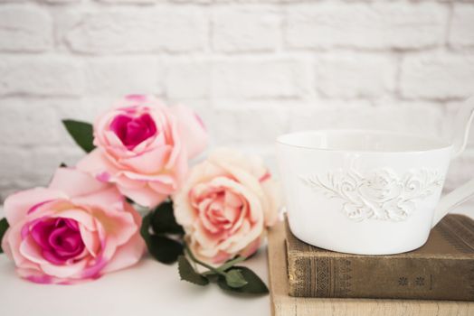 Bouquet of roses on a white desk, A large cup of coffee over old books, Romantic floral frame background, Floral Styled Wall Mock Up, Rose Flower Mockup, Valentine Mothers Day Card, Giftcard