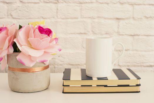 White Mug Mockup. Blank White Coffee Mug Mock Up. Styled Photography. Coffee Cup Product Display. Coffee Mug On Striped Design Notebooks. Vase With Pink Roses