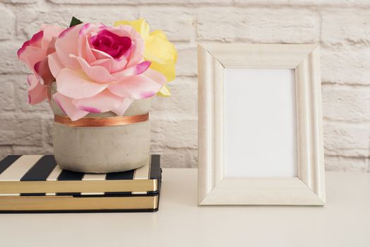Frame Mockup. White Frame Mock up. Cream Picture Frame, Vase With Pink Roses on Stripe Notebooks. Product Frame Mockup. Wall Art Display Template, Brick Wall