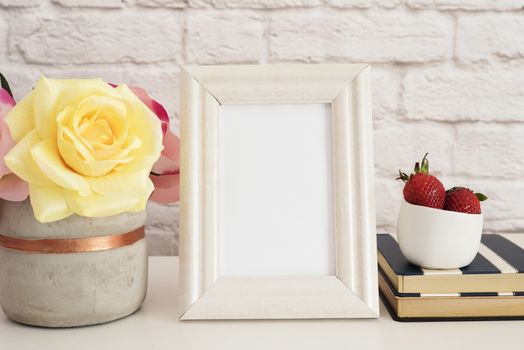 Frame Mockup. White Frame Mock up. Cream Picture Frame, Vase With Pink Roses, Strawberries on Stripe Notebooks. Product Frame Mockup. Wall Art Display Template, Brick Wall