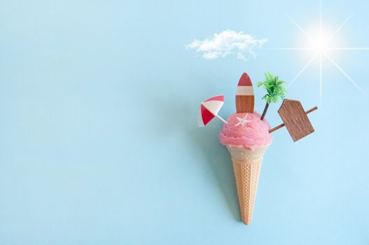 Strawberry icecream with beach items below sun 