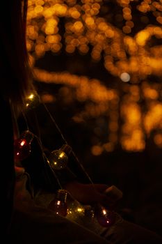 Close up of large golden bokeh shapes.