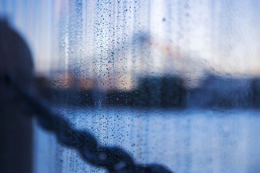 Close up of lots of rain drops on glass.