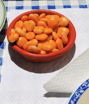 container with lupine beans