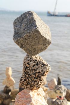 stones balanced on the seashore