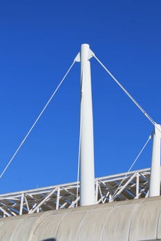 White architectural structure with blue sky background