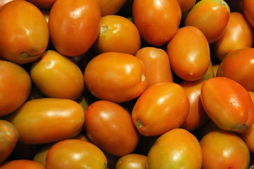 Basket of fresh red vegan vegetable tomatoes