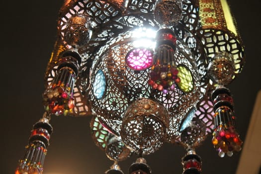 Typical Indian lamp with colored glasses