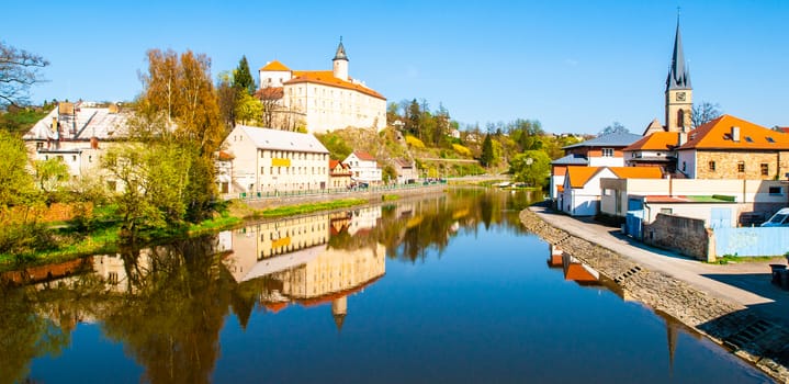 Sazava River in Ledec nad Sazavou. Panoramic view with Ledec Castle and town centre.