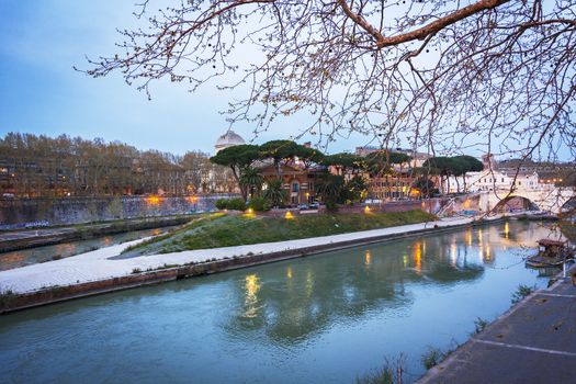 The historical Tiber island from the Garibaldi Bridge in Rome.