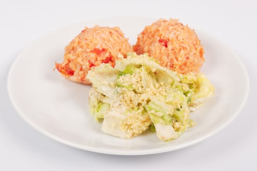 Tomato rice and salad on a white background